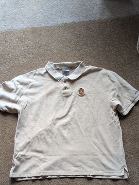 Disney Tan Men's Polo Shirt with Embroidered Crest